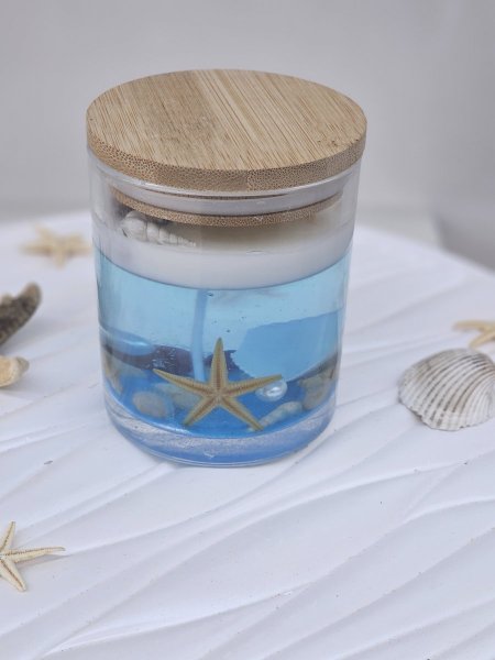 شمعة زجاج شفاف بحرية